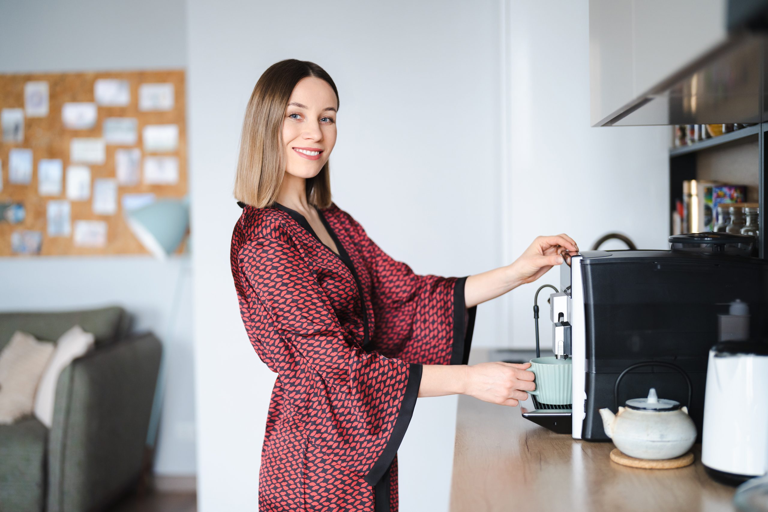 worker using office kitchen appliances