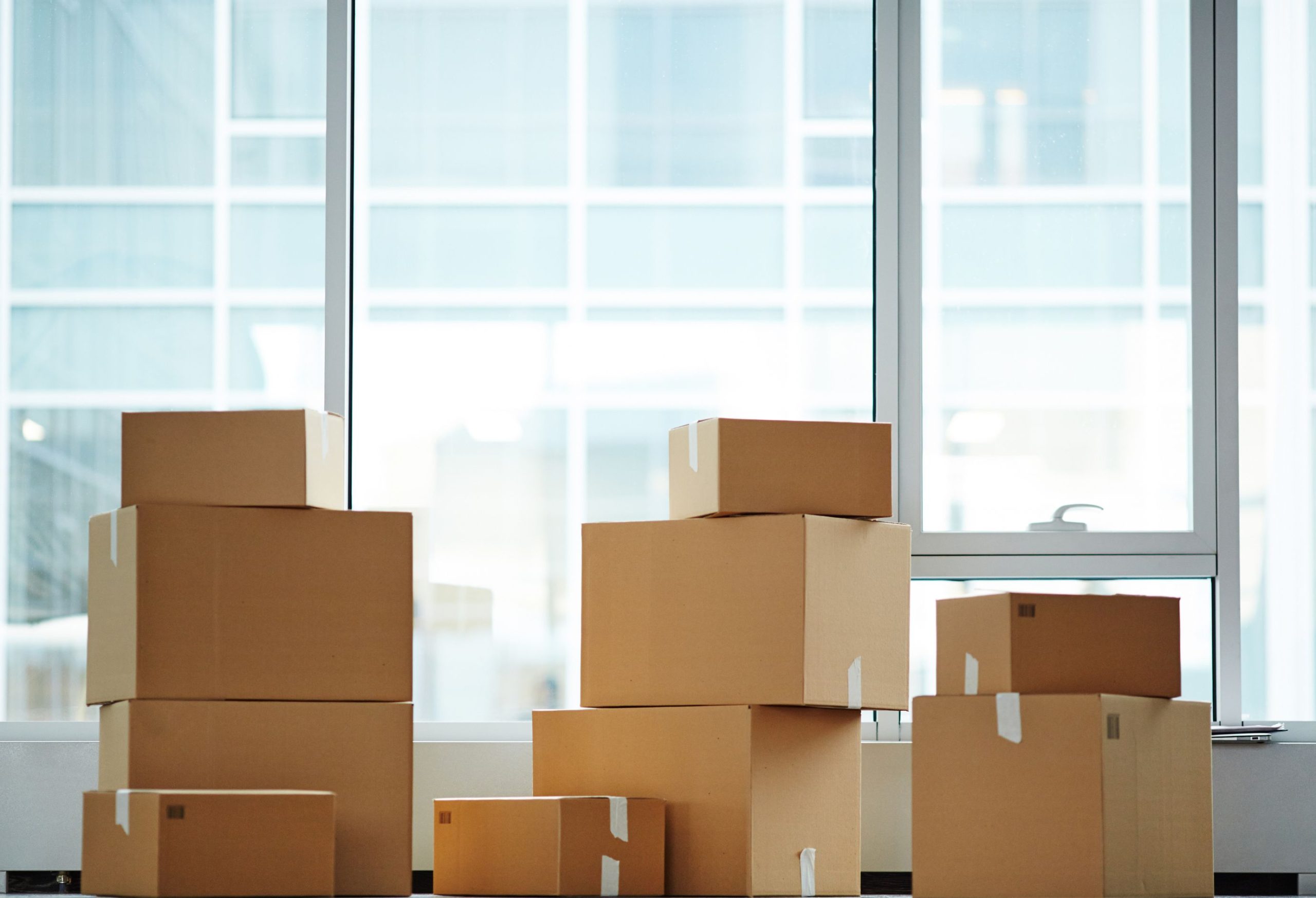 Packed boxes in office space